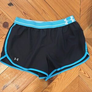 Women’s Under Armour heat gear shorts in medium.
